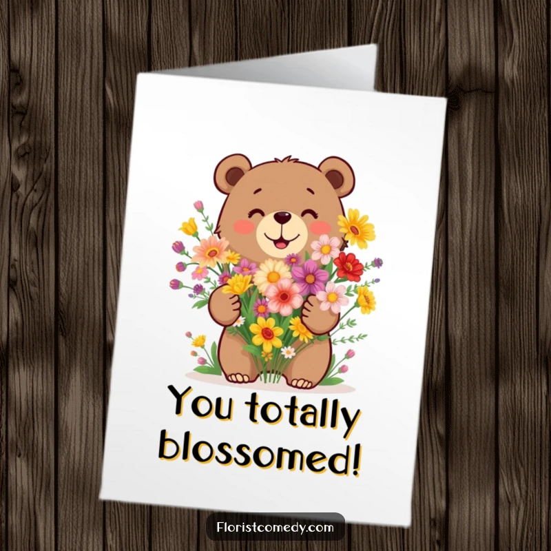 Funny Free Printable Congratulations Card featuring a happy bear arranging a lively bouquet of diverse wildflowers.